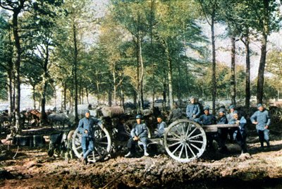 A group of French artillerymen with 75 mm guns during the battle of Verdun, September 1916 by Jules Gervais Courtellemont